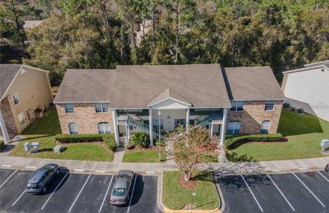 2 Bedroom 2 Bath Corner Unit Ground Floor Condo Near UCF with Tile Flooring and Scenic View! photos photos