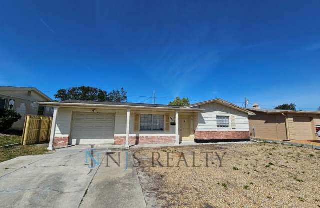 True 2/1.5/1 with FIREPLACE, fenced yard and all tile flooring throughout! photos photos