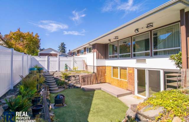 Spacious Puyallup Home with Suite-Style Basement, Tiki Bar & Garden Retreat! photos photos