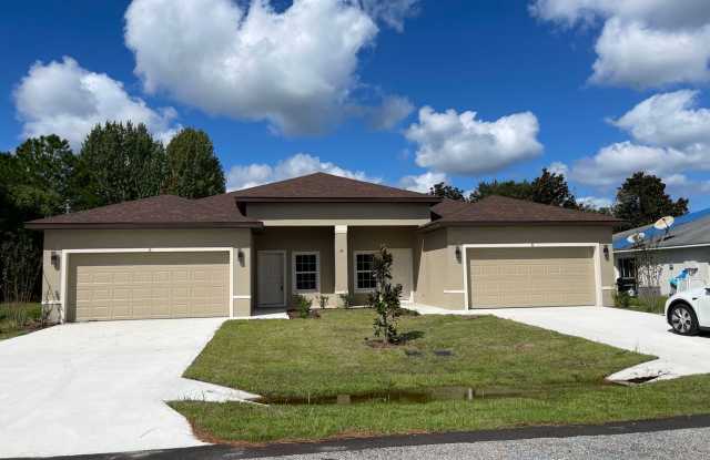 Like new 4/2/1 with screened in porch - 24 Buttonbush Lane, Palm Coast, FL 32137