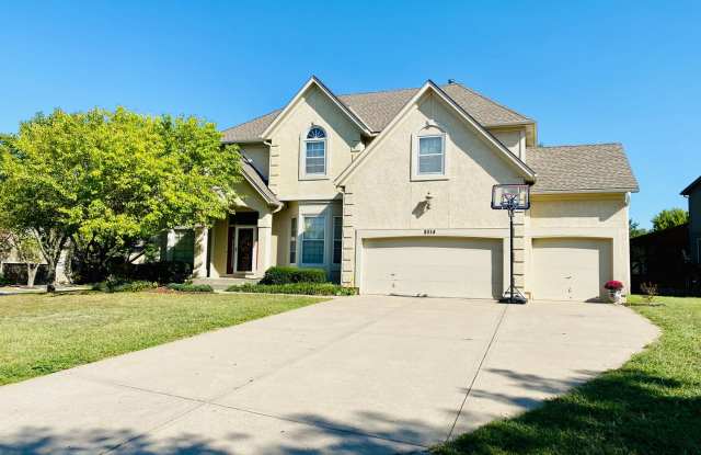 {8514} Village of Kensington + Finished Basement + 3 Car Garage + Community Pool + Blue Valley Schools! photos photos