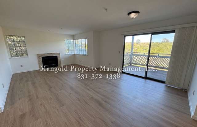 Spacious 2-Bed, 2-Bath Condo with Fireplace & Private Balcony Gallery 4