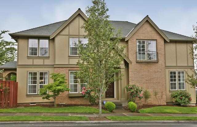 12702 NW Alsace Ln. ~ Move-in Special $500 off 2nd months rent!! MAGNIFICENT CUSTOM HOME photos photos