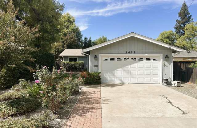 Bright & Spacious 3-Bedroom Home with Large Lot, Attached Garage & In-Unit Laundry Gallery 1