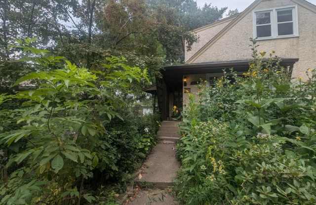 Charming Garden Oasis in West St. Paul – Fire Pit, Pond  Prime Location! photos photos