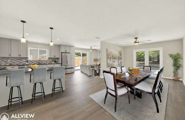 Newly Remodeled 4-Bedroom Gem with Spacious Backyard  2-Car Garage photos photos