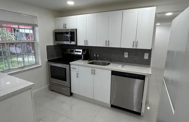 407 NW 33rd St - 407 Northwest 33rd Street, Miami, FL 33127