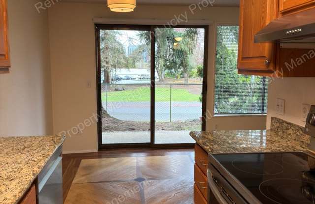 Kirkland Gem! Ground-Floor 1-Bedroom Condo w/2 Parking Spots & Beautiful Fireplace! photos photos