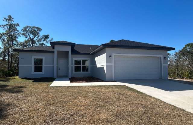 SPACIOUS 4 BEDROOM- 2 BATHROOM RETREAT IN BEAUTIFUL LAKE PLACID photos photos