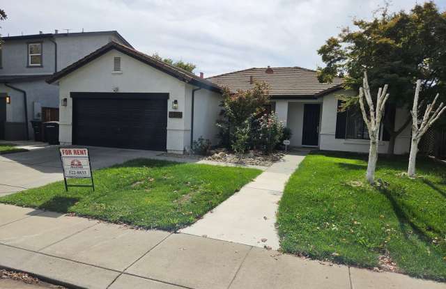 Spacious 3 Bedroom Home with Private Backyard and Garage — 3208 St. Ann Way, Modesto Gallery 1
