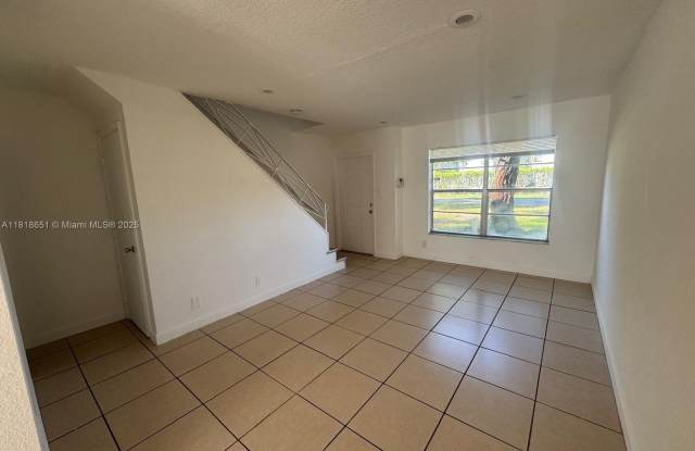 4820 NW 9th Dr photos photos