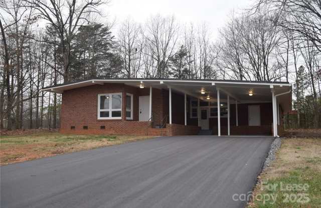 Charming 3 Bed 2 Bath Brick Home with Renovated Kitchen – $1800/Month photos photos