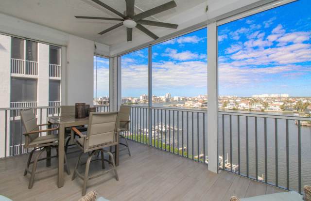 ** WEEKLY OR MONTHLY RENTAL ** STUNNING 8th FLOOR 3 BR/2.5 BATH CONDO WITH LONG BAY VIEWS - REGATTA AT VANDERBILT BEACH II ** photos photos