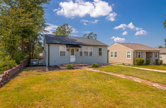 Freshly Renovated Cammack Village Home with Hardwood Floors & Spacious Backyard Gallery 1