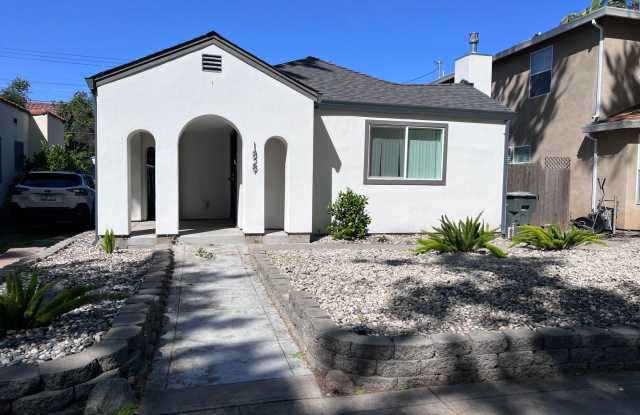 Beautiful Land Park home with fresh paint and new flooring throughout. photos photos