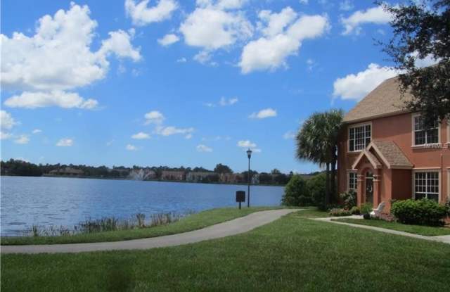 Water view condo with garage in sought after westchase photos photos