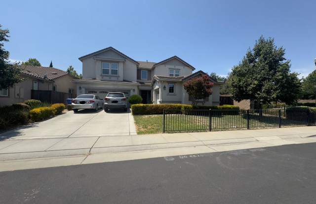 Beautiful home with 4 bedrooms and 3.5 baths located in Elk Grove. photos photos