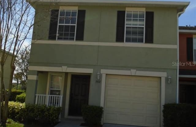 592 CRESTING OAK CIRCLE - 592 Cresting Oak Cir, Southchase, FL 32824