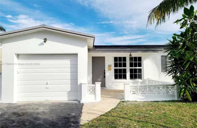 4230 NW 52nd Ave photos photos