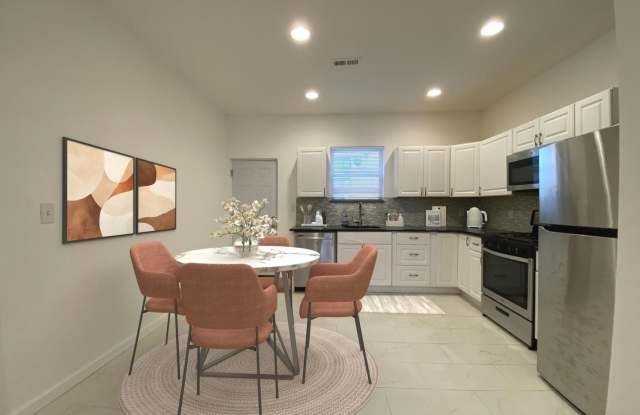 Updated 2-Bedroom Home with Finished Basement and Private Yard Near University City Gallery 3