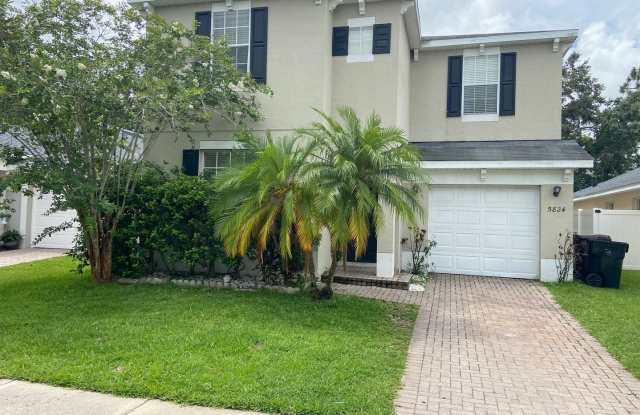 4BD/2.5BA Spacious Home in Orlando with Wood Flooring! - 5824 Mariposa Cove Lane, Orlando, FL 32822