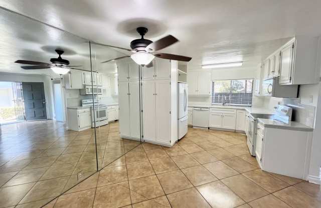 Spacious 3 Bedroom 2 Bathroom Town-Home with In-Unit Laundry, Pool and 2 Parking Spaces! photos photos