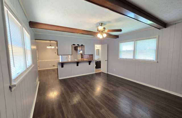 Brick Ranch in the heart of Jeffersontown! Featuring hardwood styled floors, 3 Bedrooms, 1.5 Bathrooms and an unfinished basement. Located on a quiet cul de sac and backing up to a wooded lot, this offers a respit in the City! photos photos