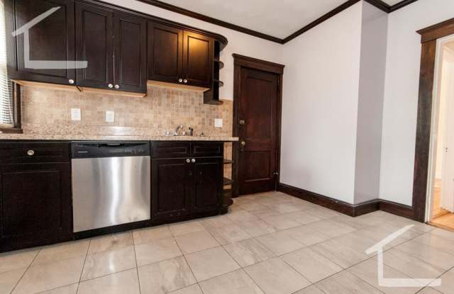 Nicely renovated 3 bed with a parking spot included! photos photos