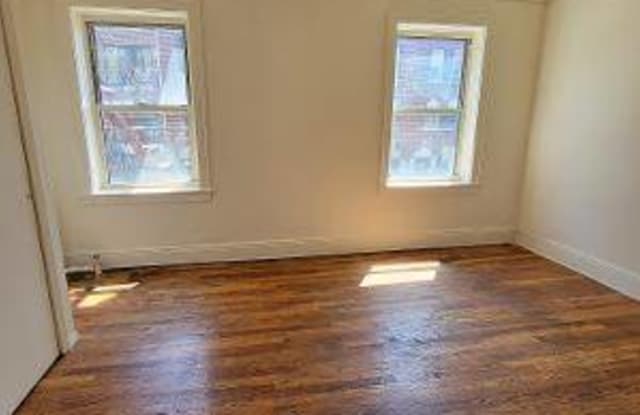 6002 WOODSIDE AVE - 6002 Woodside Ave, Queens, NY 11377