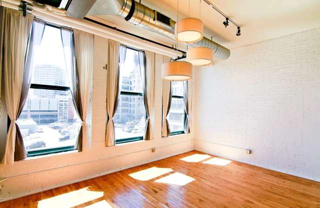 Spectacular industrial style studio, 1 full bath 466 sq ft condo in desirable Downtown St Paul! photos photos