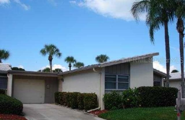 143 WHISPERING SANDS DRIVE - 143 Whispering Sands Drive, Siesta Key, FL 34242