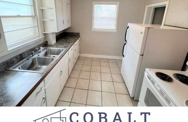 Spacious 2Bdr, duplex Apt with Garage Half block west of KSU photos photos