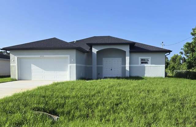 COMING SOON-BRAND NEW CONSTRUCTION-LARGE CUSTOM 3/2/2 - SW LEHIGH ACRES photos photos