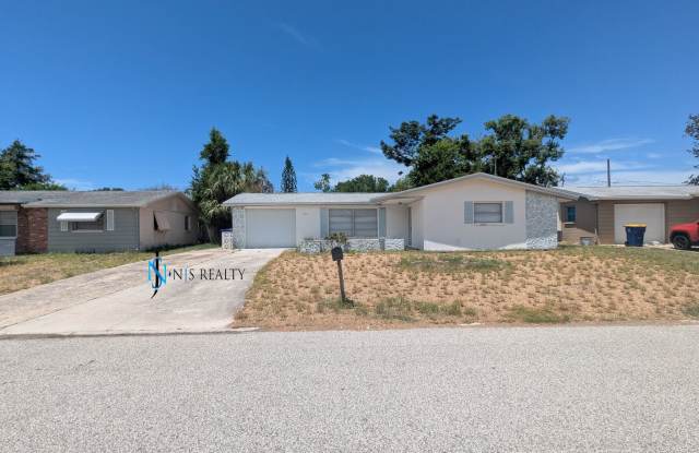 Recently renovated 2/2/1 1300 Sq. Ft. Freshly painted, tile throughout, updated kitchen and MASSIVE screened porch! photos photos