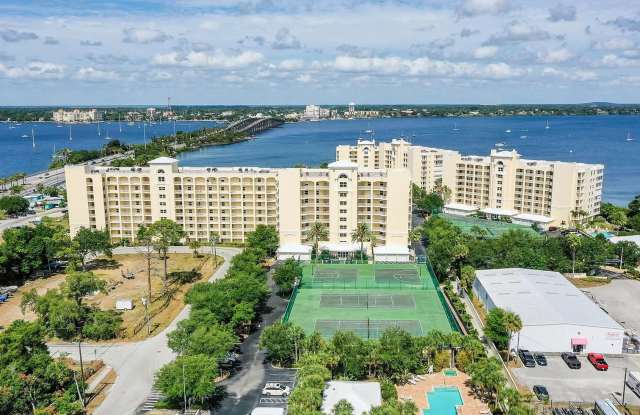 Luxury Waterfront Living at Island Pointe – Fully Renovated 3BR Top-Floor Condo with Panoramic Views! photos photos