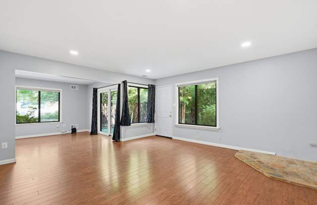 Tucked within the serene, tree lined setting of Covington, this contemporary townhome offers a refined sense of privacy paired with modern design. Gallery 4