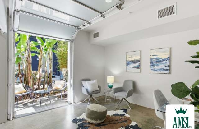 1-Bedroom + Den/Office, 2-Bath Townhome with EV Charging & Secure Parking Gallery 1