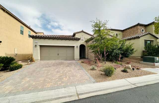 Immaculate Rhodes Ranch Golf Course Community home with a contemporary open floorplan and mountain views! photos photos