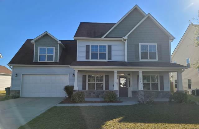 Immaculate 4 Bedroom, 3.5 Bath Home Located in Established Neighborhood. Minutes from Fort Bragg! photos photos