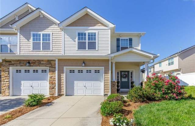 Resort style living 3 bedroom 2.5 bath Townhouse at MacIntosh on the Lake west of Burlington w/ 1-car garage Gallery 1