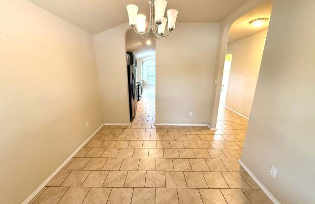 Inviting 3-Bedroom Home with an Island Kitchen & Large Fenced Backyard! Gallery 4