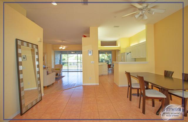 ***FURNISHED***3 BED/2 BATH VILLA W/ GARAGE***NORTH NAPLES ***CALUSA BAY SOUTH***GATED***LAKE VIEW*** Gallery 1