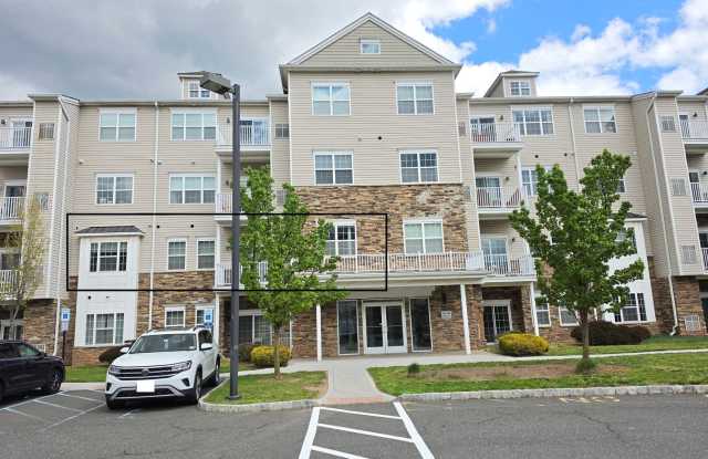 Beautiful 2nd floor (with elevator services) condominium: 2-bed, 2-bath, beautiful kitchen, bonus room, laundry room & deck! photos photos