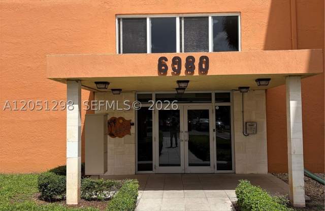 6980 NW 186th St - 6980 Northwest 186th Street, Country Club, FL 33015