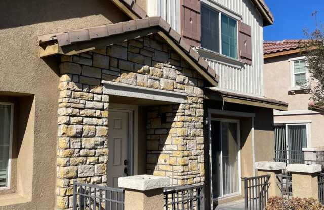 Move-In Ready 2-Bedroom Townhome with Attached Garage in Gated Palacio De Oro Gallery 1