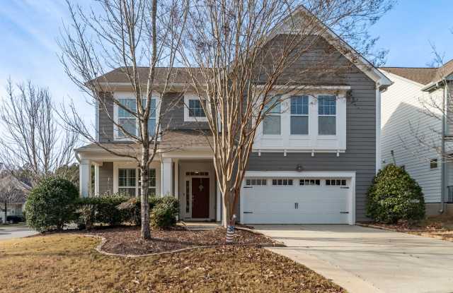 Stunning 4BR/3.5BA Home in Woodcreek-Available Now! - 412 Hidden Stream Drive, Holly Springs, NC 27539