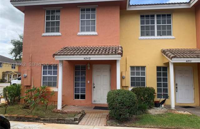 4243 NW 68th Way photos photos