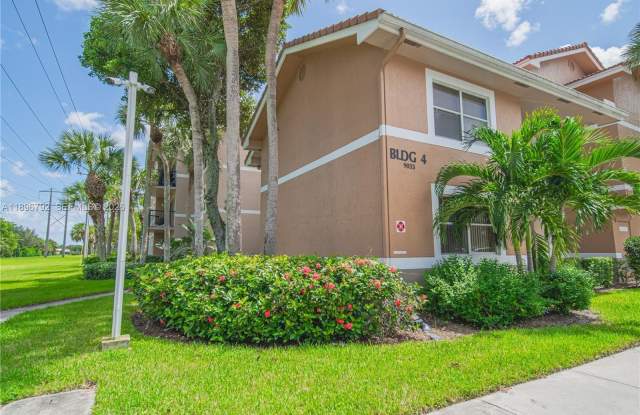 9033 Wiles Rd photos photos