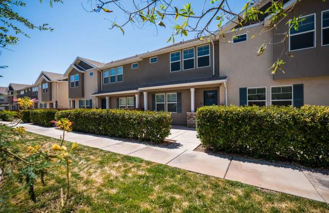 Available August 10th - Dog Friendly (under 30 lbs) . 3 Bed 2 1/2 Bath 2 Car garage townhome Gallery 1