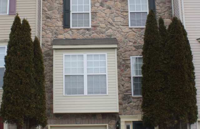 Modern Townhome Featuring Attached 1-Car Garage photos photos